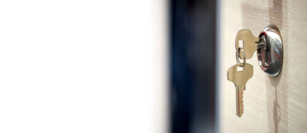 istock keys in the keyhole with white text field 1248212485