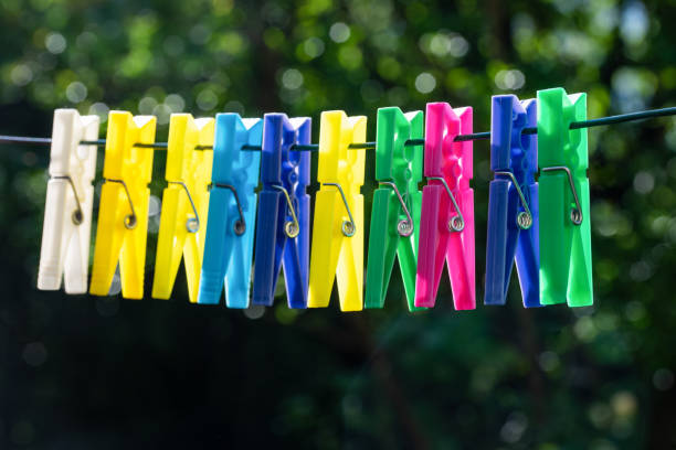 istock Group of multicolor clothespins 1248216438