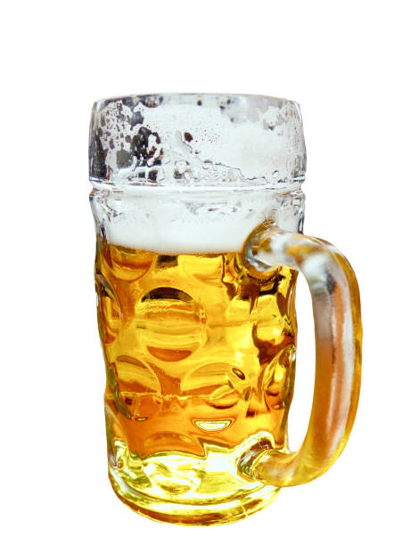 Part drunk glass stein of german beer Litre of german beer in a traditional stein glass, partly drunk large german beer steins stock pictures, royalty-free photos & images