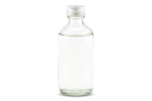 istock Cold pressed coconut oil in bottle on white background with clipping path 1248225083