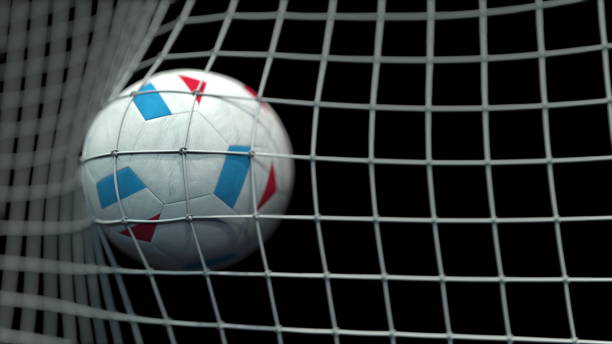 istock Ball with flags of Luxembourg hits goal. 3D rendering 1248227474