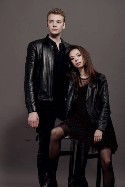 istock cool man and woman on gray background 1248228094