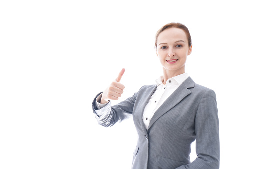 Business woman wearing a suit having Good Sign