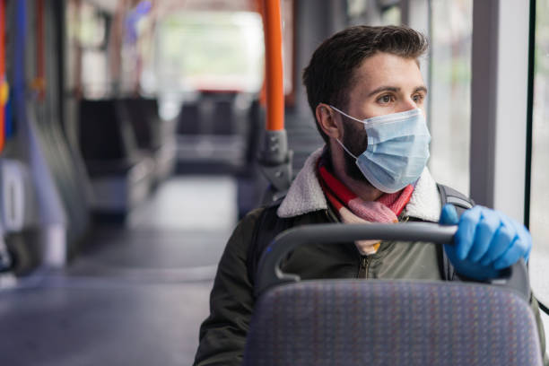 istock Man travelling alone in the tram during Covid-19 pandemic 1248231493