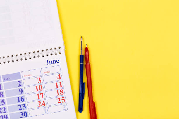 istock White clean calendar 2020  on solid yellow background with copy space, business meeting schedule, travel planning or project milestone and reminder concept. 1248231744