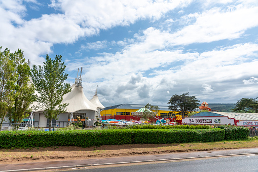 Minehead, UK - June 2019: view of dodgems from a public road. This is part of the Butlins complex and is visible from the beachfront promenade.