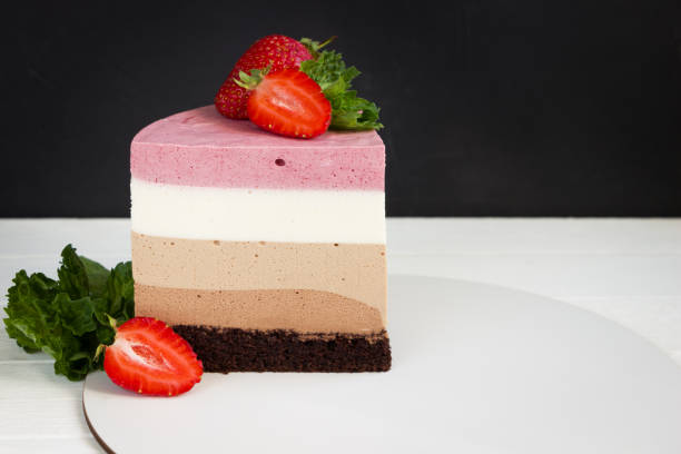 istock Piece of triple chocolate mousse cake with strawberryes, baking template, empty space 1248233511
