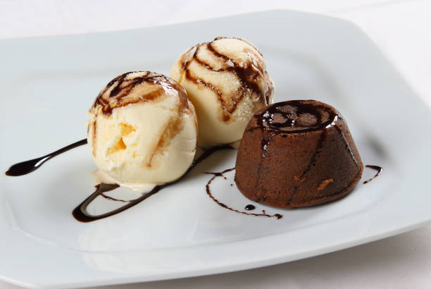 istock petit gateau with ice cream and chocolate sauce. 1248235016