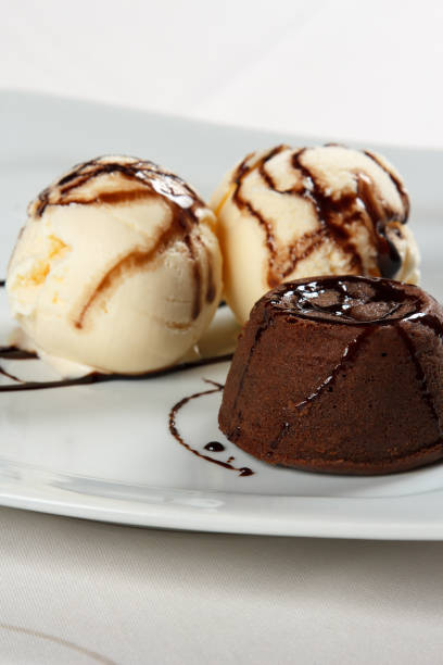 istock petit gateau with ice cream and chocolate sauce. 1248235018