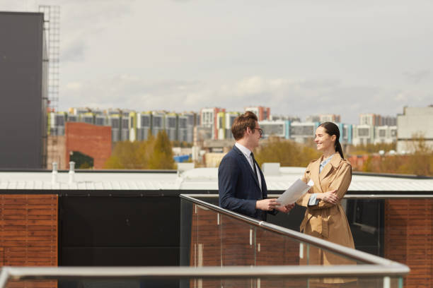 istock Young Business People on Roof 1248235387