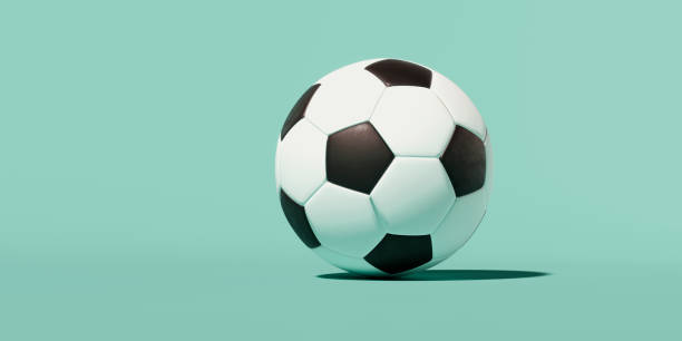 istock 3d image, black and white classic soccer ball on a green background 1248239711
