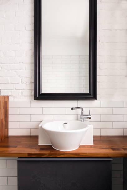 istock Interior of comfortable light bathroom with simple design 1248242634