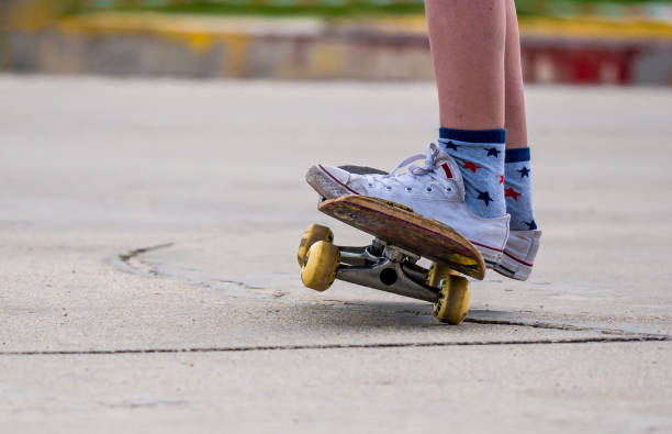 istock Close up with a young man's feet on a skateboard. 1248243451