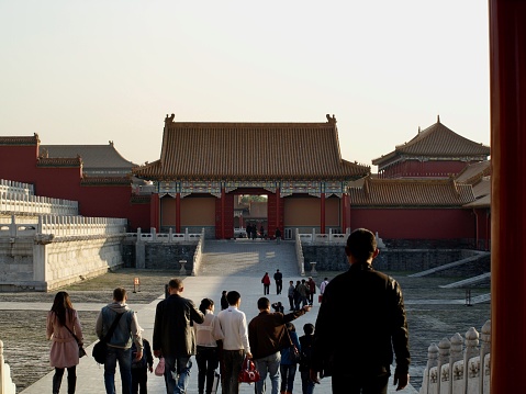 Beijing, China - October 31, 2010: People walk to the Hall of Literary Glory , Forbidden City, Beijing, China