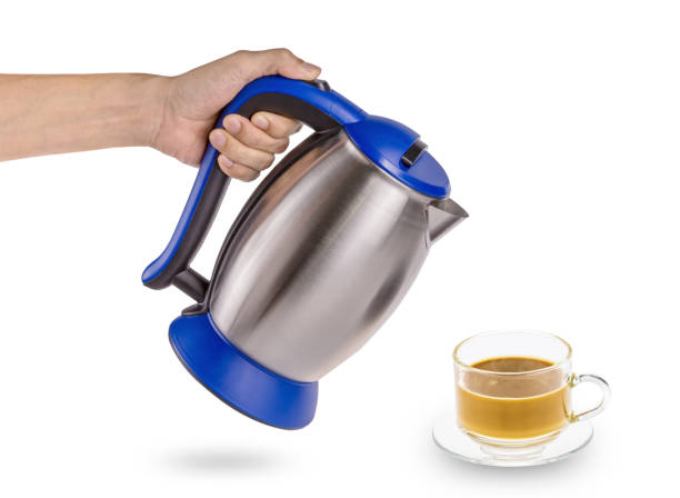 istock Electric pot with coffee cup isolated 1248245606