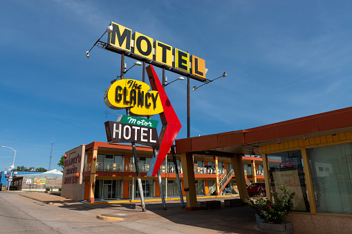 Clinton, Oklahoma, USA - July 8, 2014: The sign for The Glancy Motel, along the historic US route 66 near the city of Clinton, in the State of Oklahoma, USA.