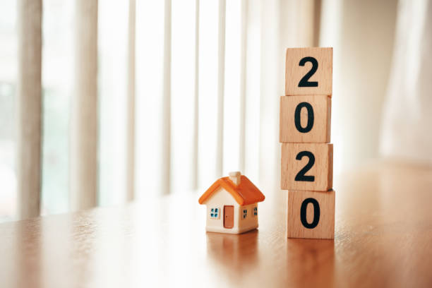 istock Mini house with wooden block year 2020 1248249227