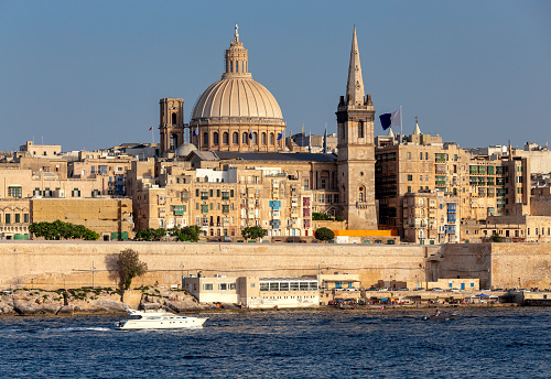 The building of the dome and bell tower of St. Paul's Cathedral on a sunny day. Valletta. Malta.