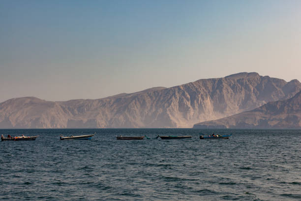 istock fishermen boats, musandam peninsula 1248256417
