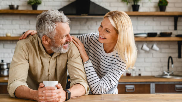 Cheerful senior couple enjoying life and fun together People, Senior Couple, Indoors, Family, Love-Emotion couple drinking stock pictures, royalty-free photos & images