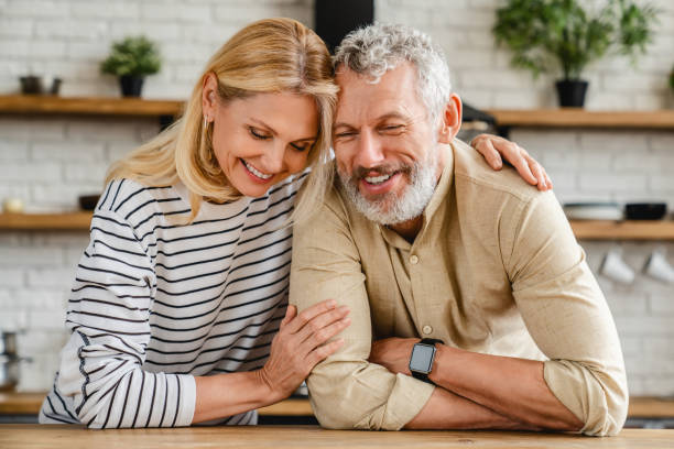 istock Romantic middle age couple spending time together at home 1248256422