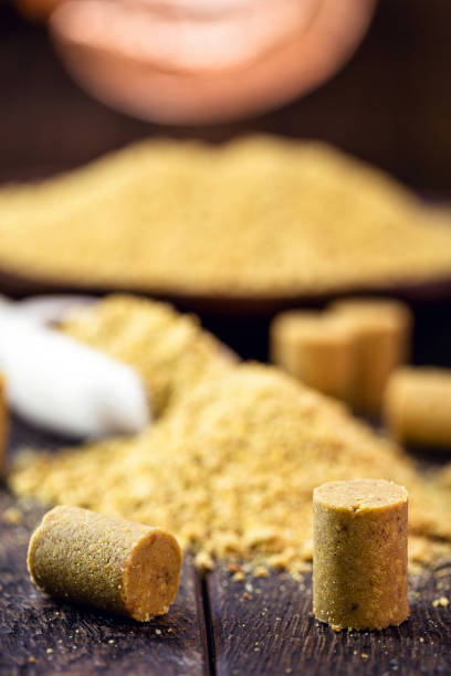 istock ground peanut flour in wooden spoon, measuring spoon. 1248256511