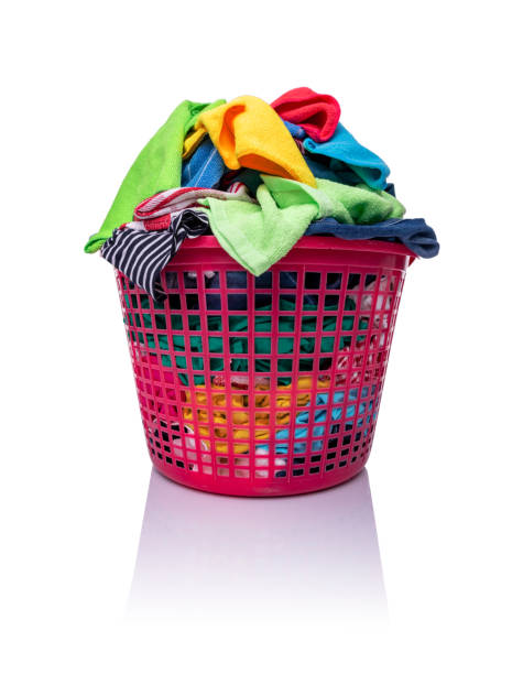 istock A basket with laundry on a white background. 1248259398
