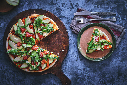 Vegan Pizza with Avocado, Tomato and Almonds