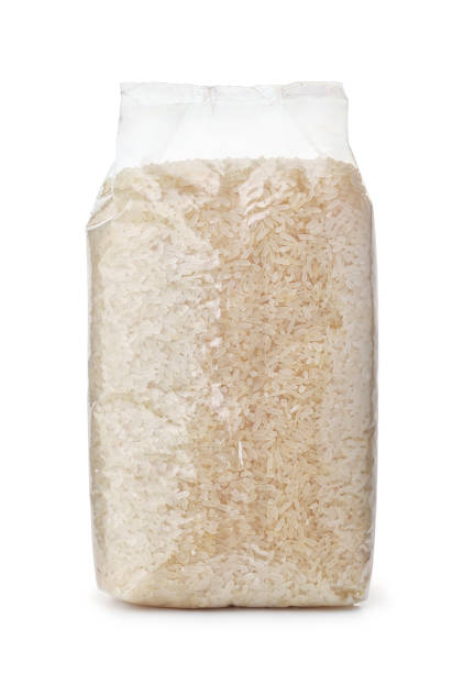 bolsa de plástico de arroz largo seco - arroz comida básica fotos fotografías e imágenes de stock