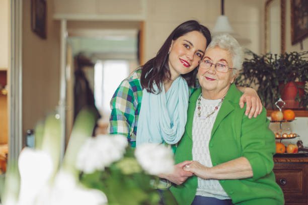 istock Social worker is visiting a senior woman 1248266462