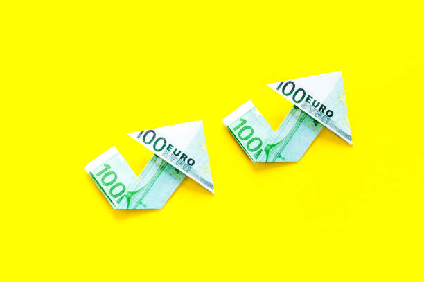 istock Isolated euro chart on yellow background. Currency trading concept 1248267792