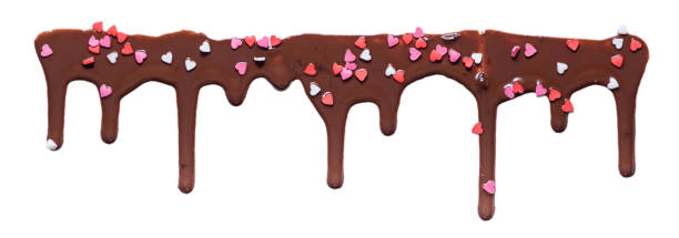 istock chocolate melted icing with heart pastry sprinkles on white background for banner, art texture, copy space 1248269349