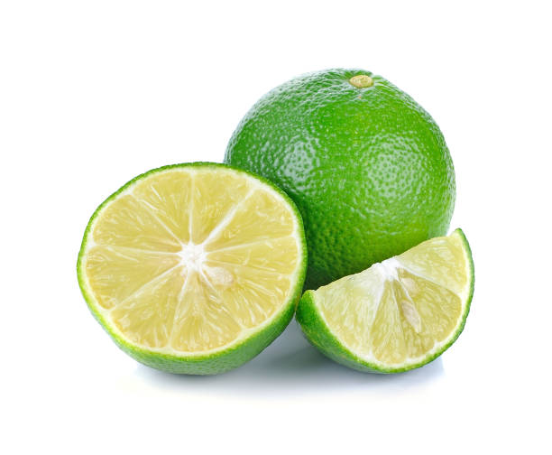 istock Fresh lime and slice isolated on white background 1248271588
