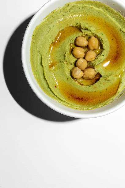 istock Homemade avocado and chickpea hummus 1248279927