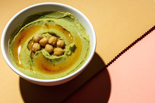 istock Homemade avocado and chickpea hummus 1248279931
