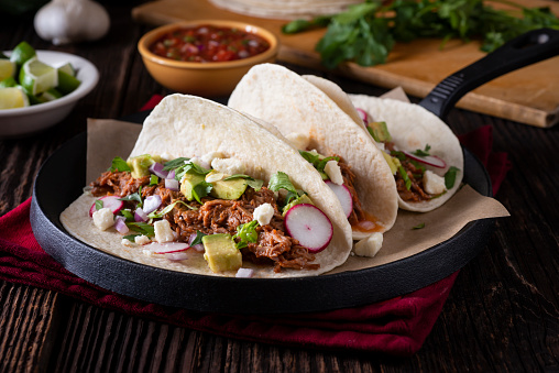 Healthy Tacos with Braised Beef, Lime, Cilantro, Avocado and Radish in Flour Tortillas