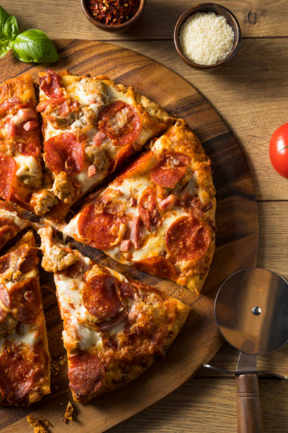 istock Savory Homemade Meat Lovers Pizza 1248283790