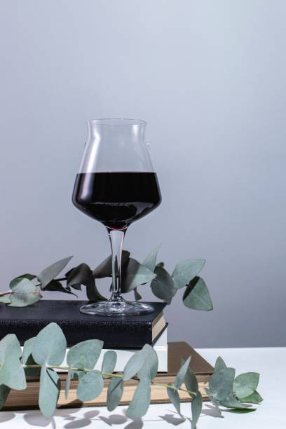 istock Glass of red wine on the table. 1248285341