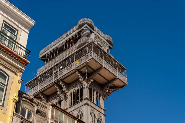 Santa Justa Elevator in Lisbon, Portugal Elevador de Santa Justa in Lisbon, Portugal, over blue sky santa justa lift portugal stock pictures, royalty-free photos & images