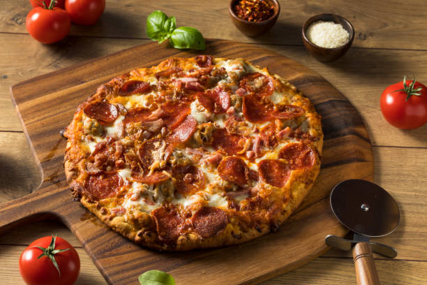 istock Savory Homemade Meat Lovers Pizza 1248285612