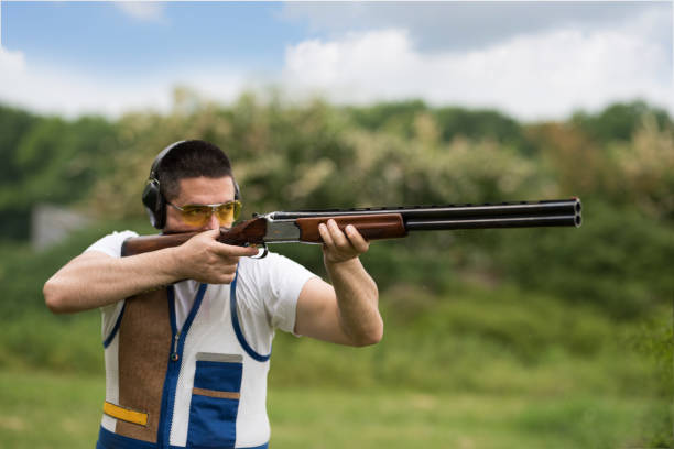 istock Man shooting on an outdoor shooting range 1248288597