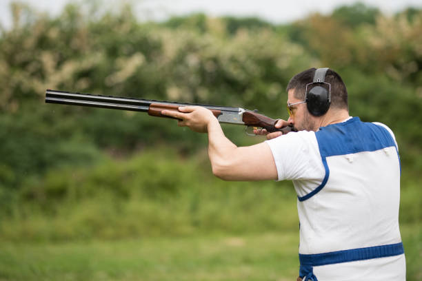 istock Man shooting on an outdoor shooting range 1248288770