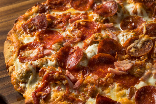 istock Savory Homemade Meat Lovers Pizza 1248289910