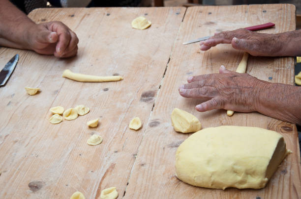 istock Knead the homemade orecchiette baresi. 1248290023