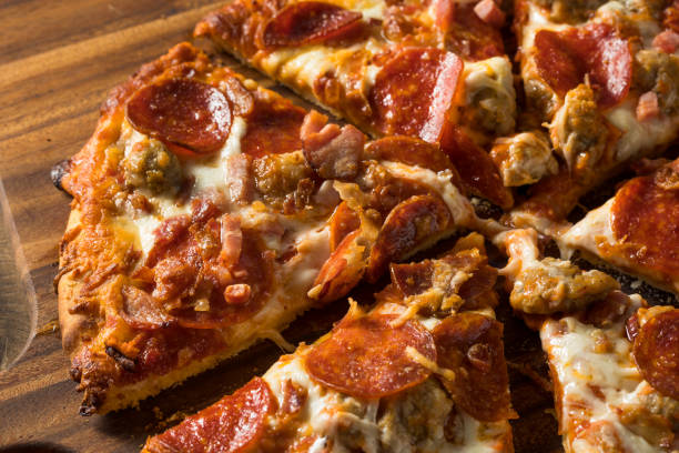 istock Savory Homemade Meat Lovers Pizza 1248290107