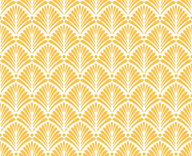 Art Deco inspired pattern with stylized palm leaf shape motif in golden yellow color. Art Deco inspired pattern with stylized palm leaf shape motif in golden yellow color. Elegant floral Art Deco seamless pattern. art deco stencils stock illustrations