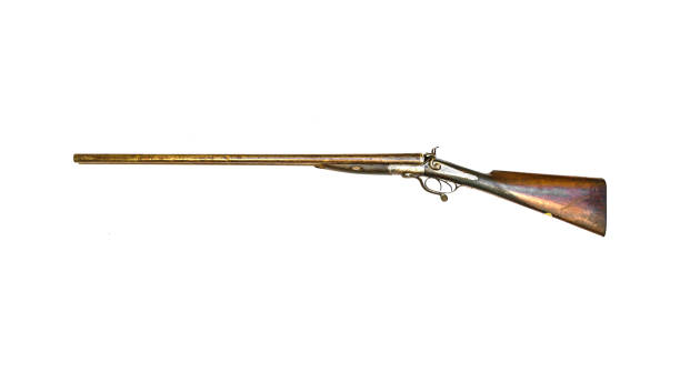 Antique Long Shotgun Isolated Side view antique musket long shotgun isolated on white background rifle old fashioned antique ancient stock pictures, royalty-free photos & images