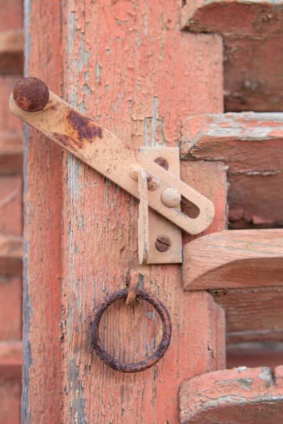 istock Locking bolt of an old wooden shutter 1248296090