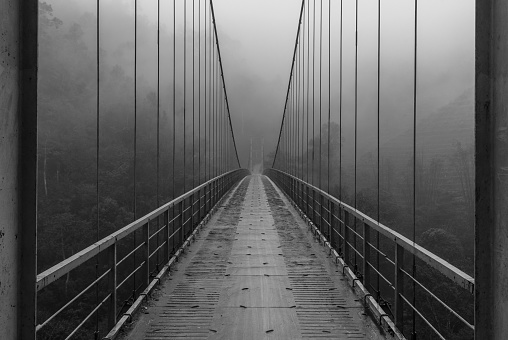 footbridge / bridge on a rainy, foggy day - vietnam