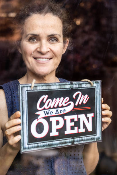 istock Smiling young woman holding a 